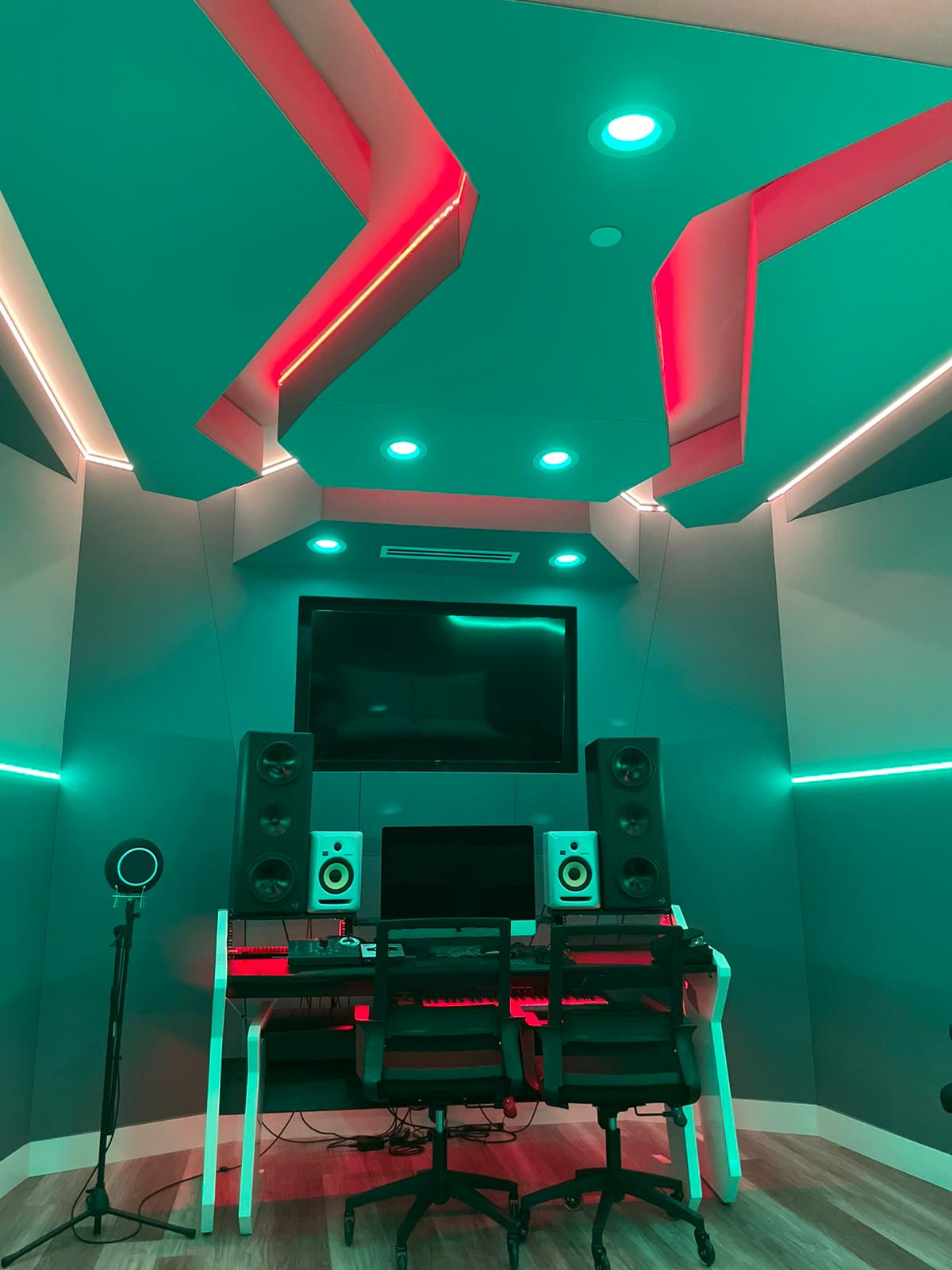 Studio design and build by Apex studio Builders with green LED's and a recessed ceiling